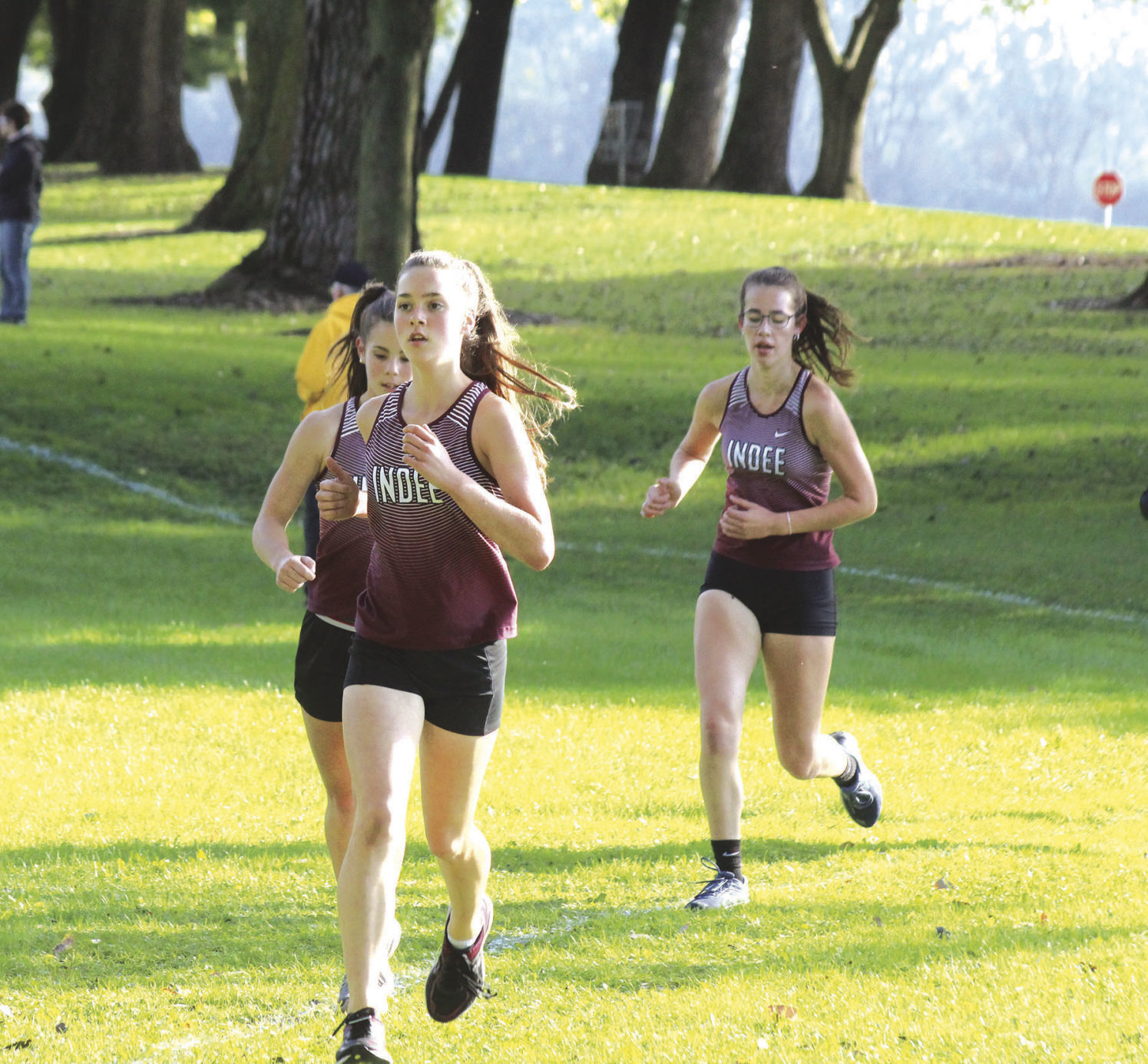 Girls varsity runners at home meet